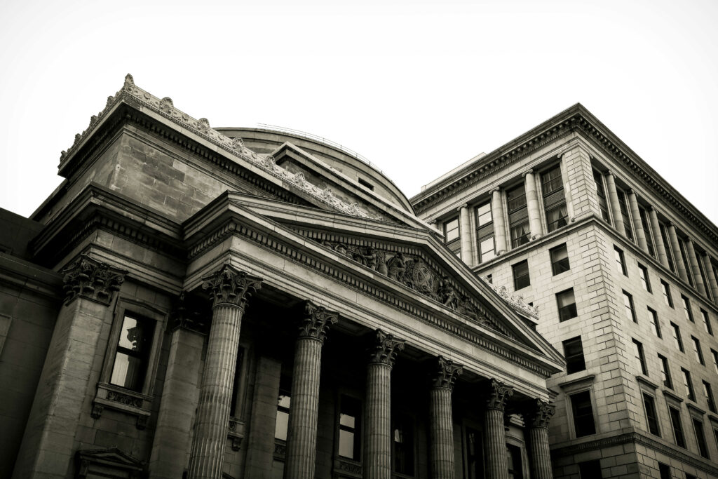 Old bank building with pillars at entrance